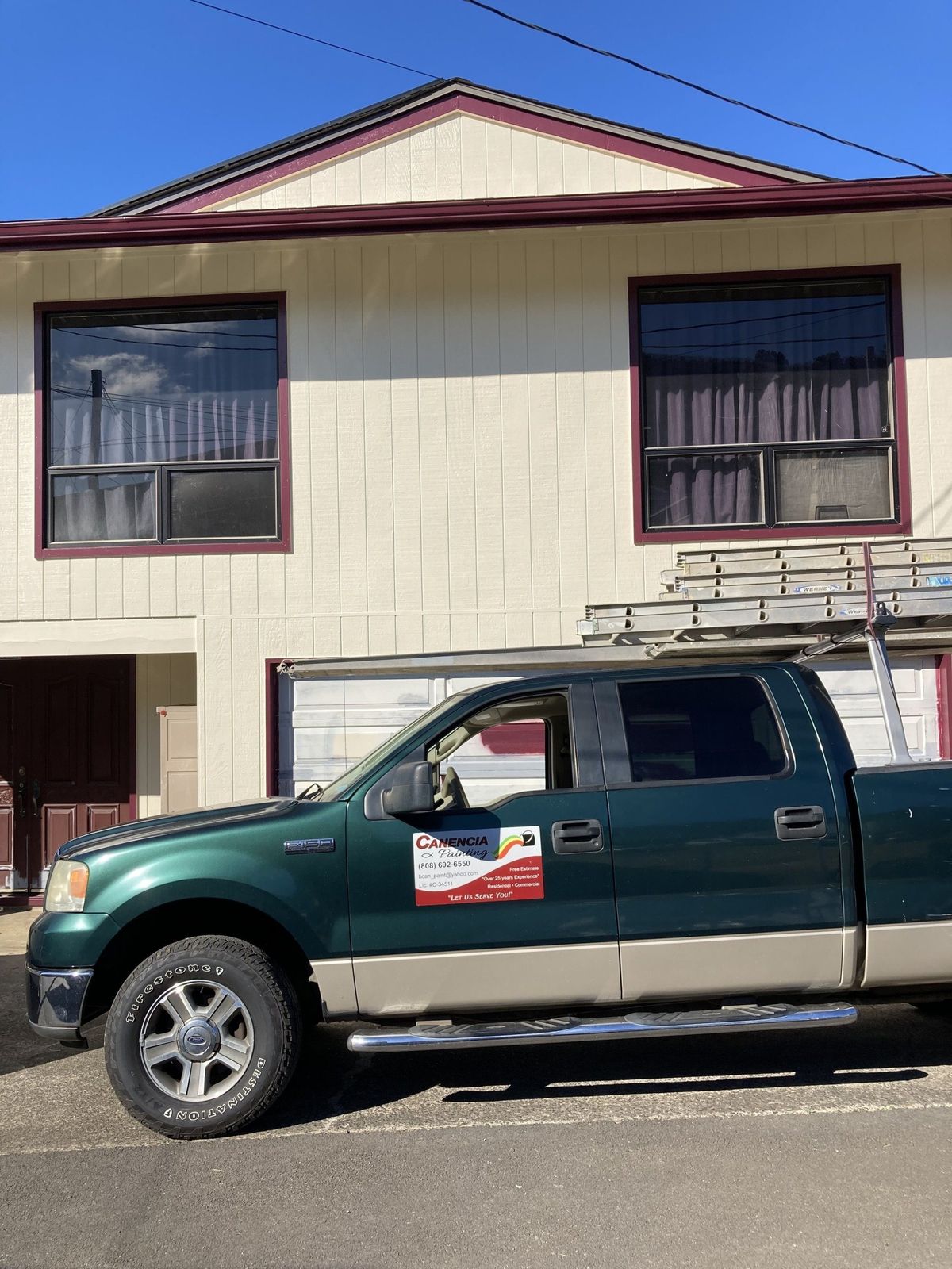 Canencia Painting truck parked in driveway of an Oahu home